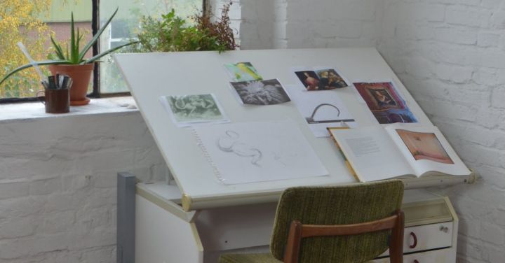 DIY Workshops - Chair placed near window and table with drawings