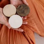 Folk Circles - Hands Holding Wooden Circles