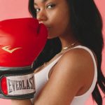 Sports Clinics - Photo Of Woman Wearing Red Boxing Gloves