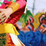 Cultural Parades - Shallow Focus Photography of Person Wearing Multicolored Costume
