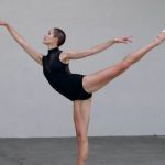 Dance Shows - Focused ballerina training in studio