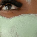 Youth Therapy - Anonymous black woman with clay mask