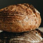 Culinary Demos - White and black loaves on table