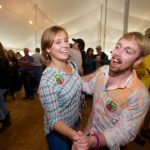 Folk Festival - a man and a woman dancing in a tent