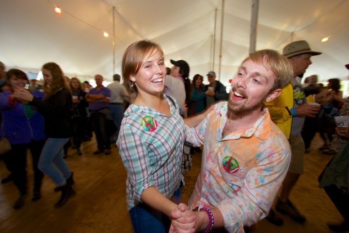 Folk Festival - a man and a woman dancing in a tent