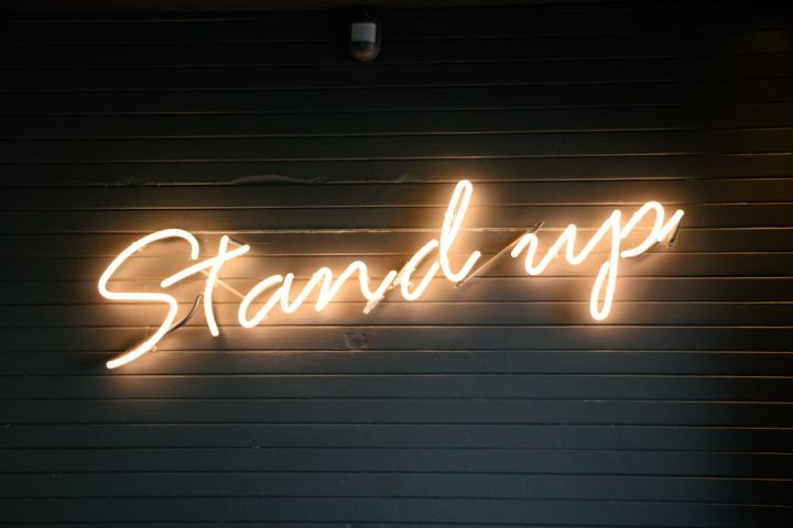 Stand-up - photo of neon signage
