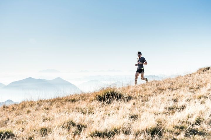 Outdoor Sport - man running on the mountain